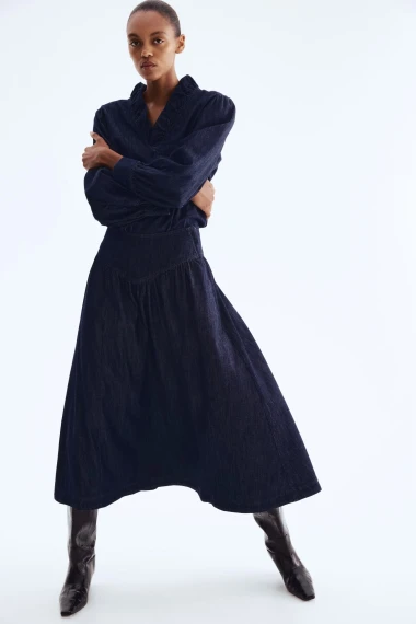 Traper suknje u zimskim kombinacijama: Bezvremenski komad koji podiže svaki outfit